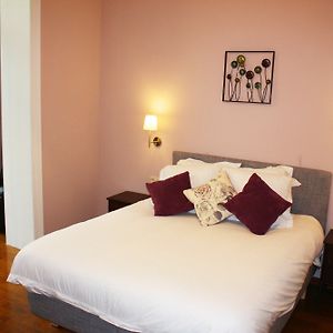 Kamer met een Queen Size Bed